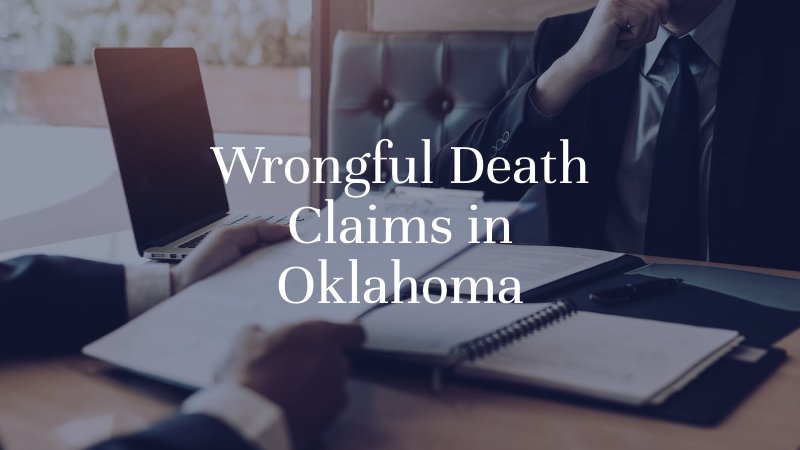 Attorney reviewing legal documents related to a wrongful death claim during a consultation in Oklahoma.