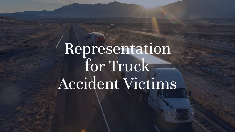 Semi-trucks traveling on an Oklahoma highway, representing truck accident cases involving commercial vehicles.